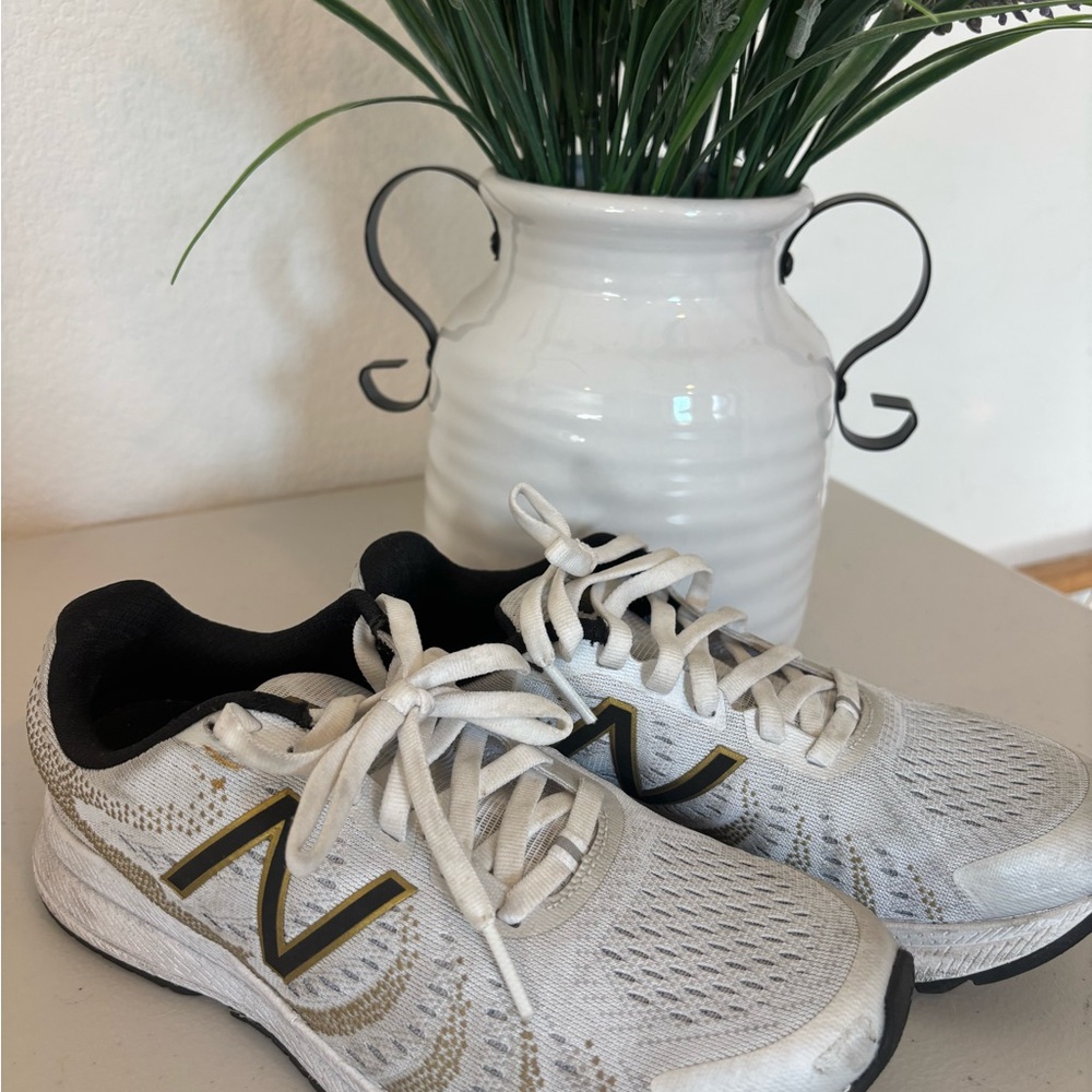 New Balance White and Black Sneakers